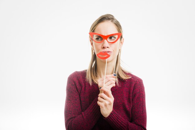 Woman with kiss mouth and red glasses