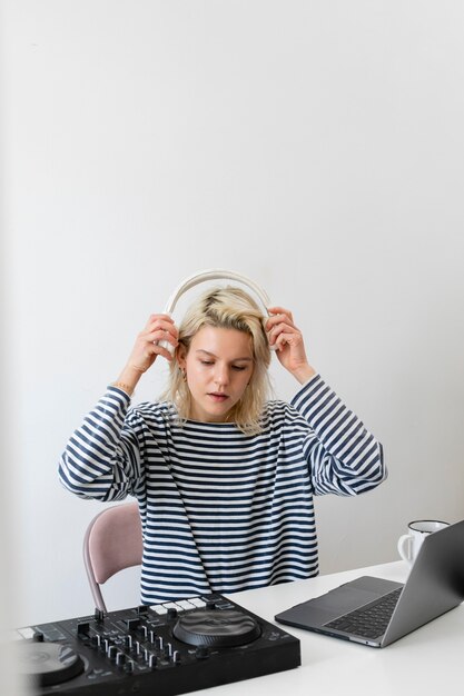 Woman with laptop working from home