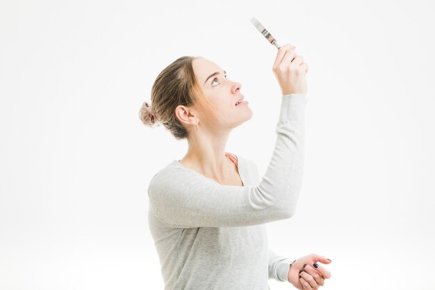 Woman with magnifying glass