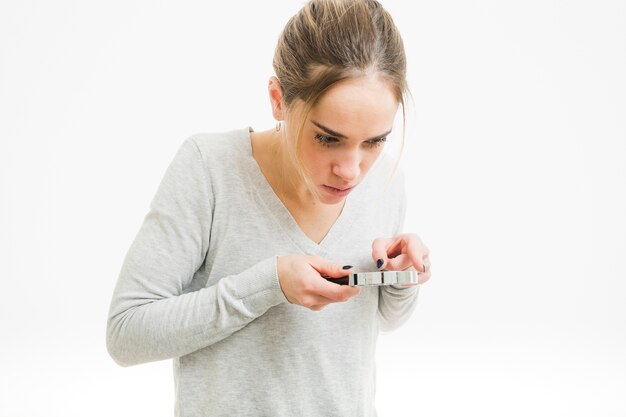 Free photo woman with magnifying glass