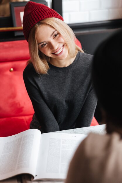 Woman with man in cafe