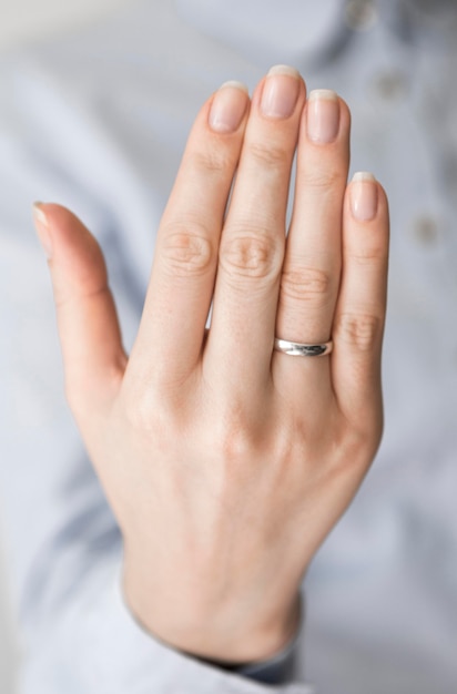 Woman with marriage ring