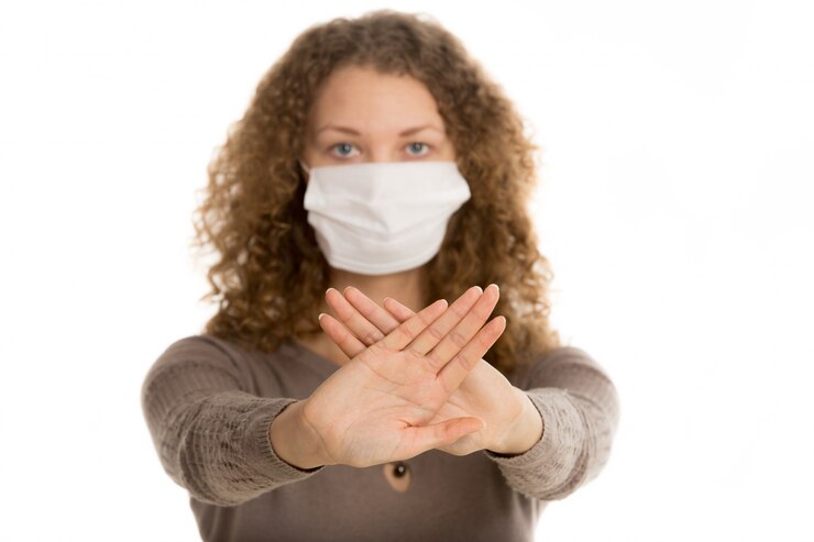 Free Photo woman with a mask