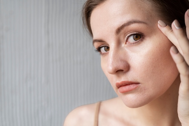 Woman with melanoma on her skin