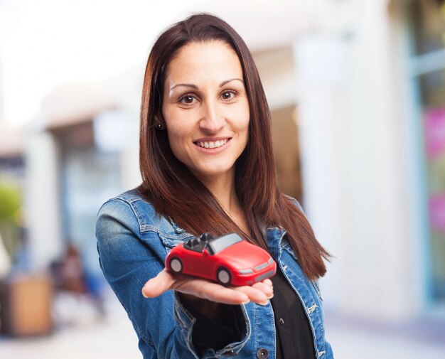 woman with a red car