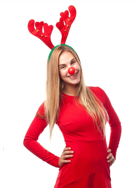 Woman with red nose and reindeer antlers