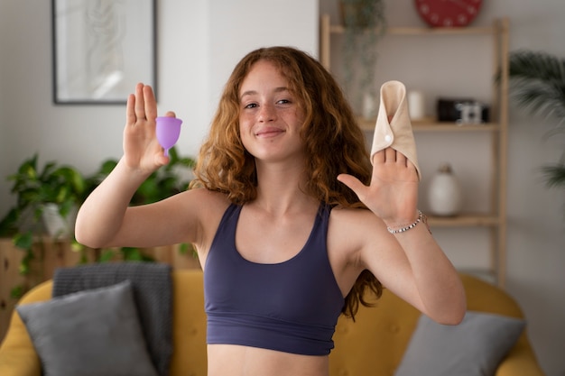 Woman with reusable menstrual products