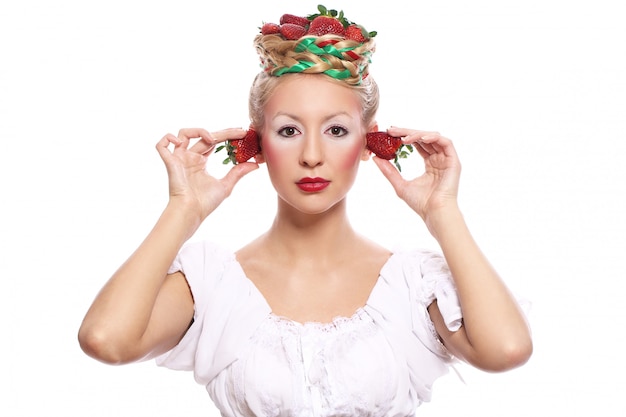 Woman with strawberry in her hairstyle