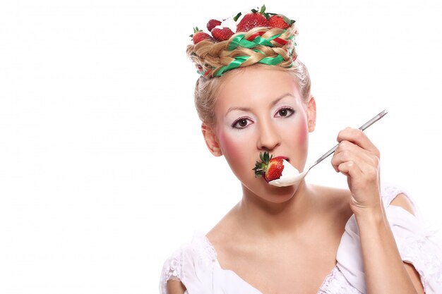 Woman with strawberry in her hairstyle