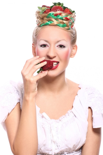 Woman with strawberry in her hairstyle