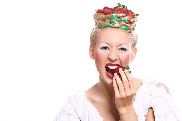 Woman with strawberry in her hairstyle