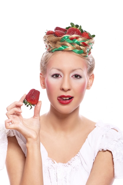 Free photo woman with strawberry in her hairstyle