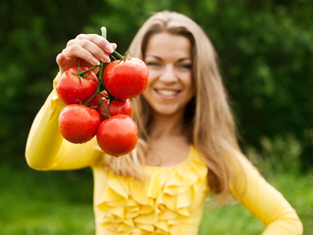 Woman with tomatoes