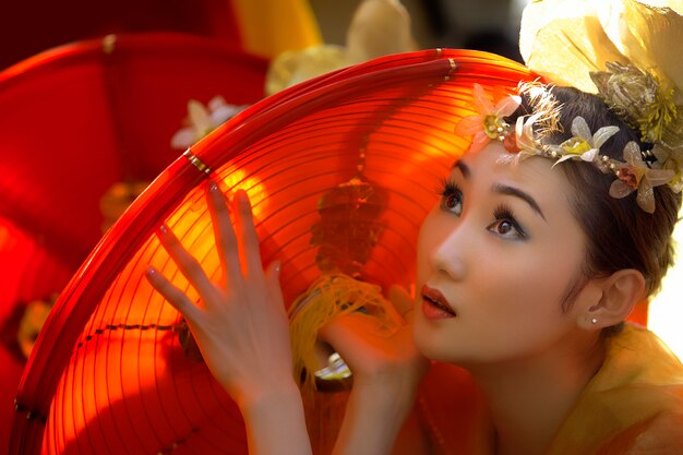 Woman with traditional asian clothes