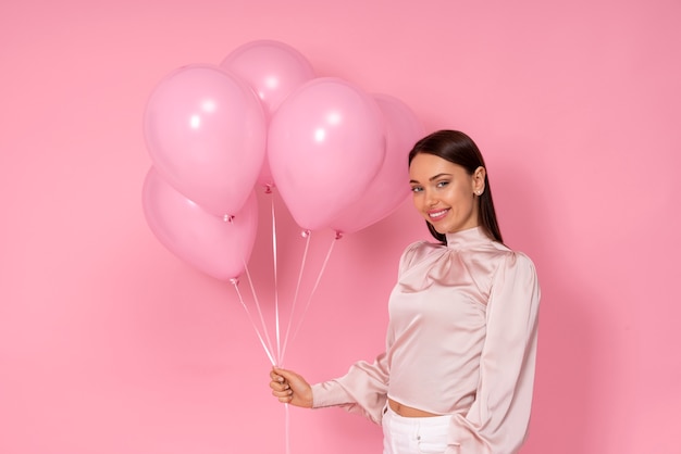 Woman with Valentines day balloons