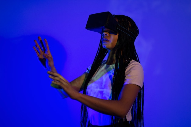 Woman with vr glasses side view