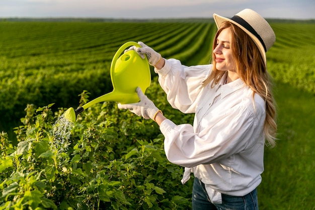 Woman with watering can