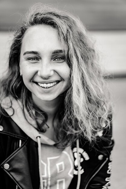 woman with white curly hair portrait close-up