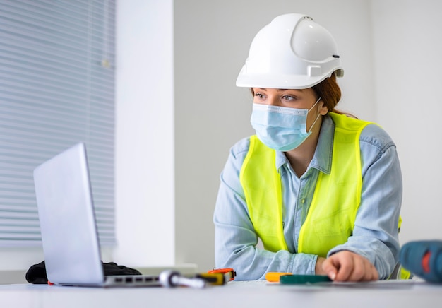 Free photo woman working as engineer