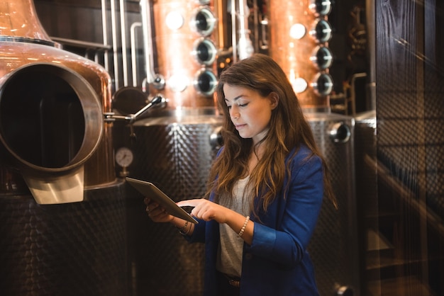 Woman working in beer factory