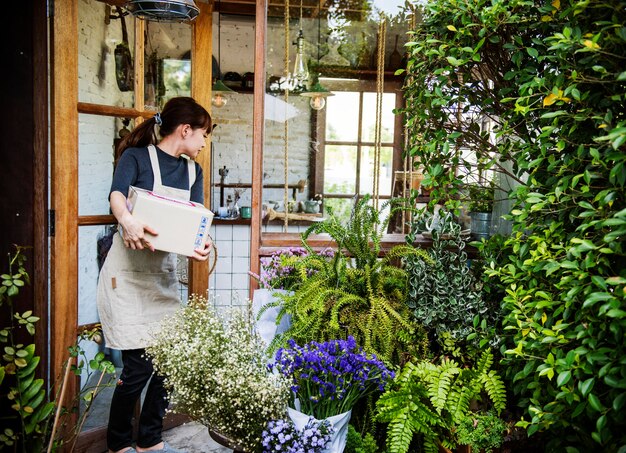 Woman working in a flower shop