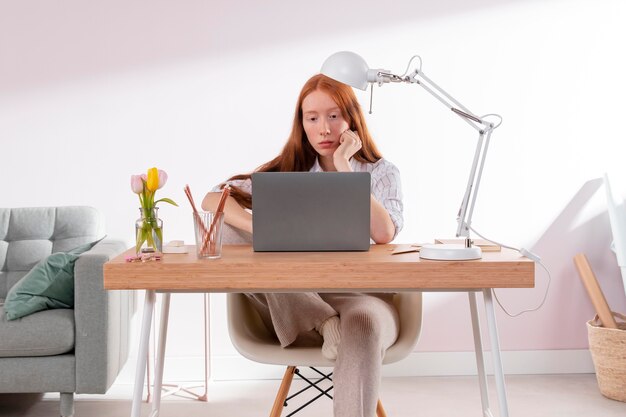 Woman working from home on laptop