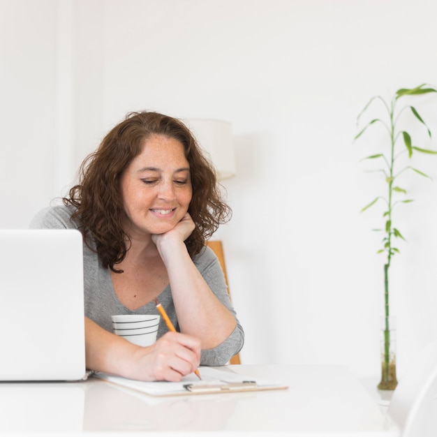 Free photo woman working from home