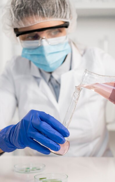 Woman working in laboratory close up