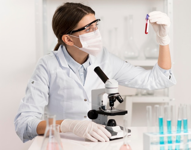 Woman working in laboratory close up