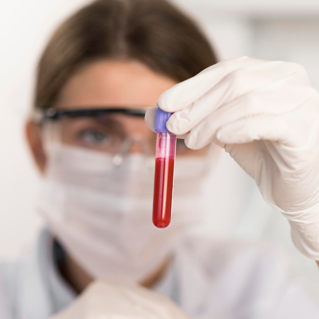 Woman working in laboratory close up