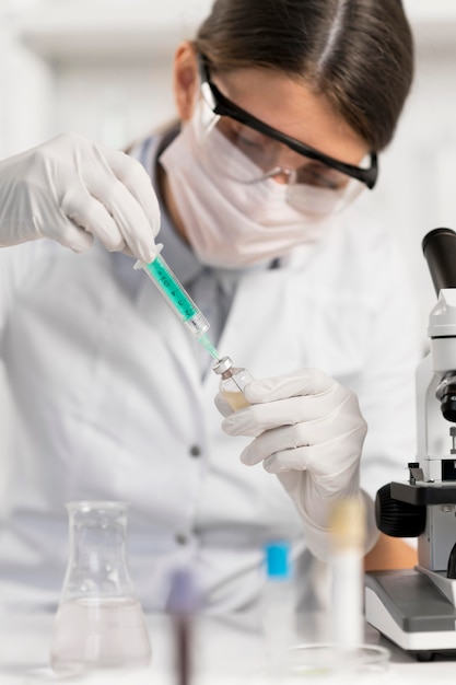 Woman working in laboratory close up