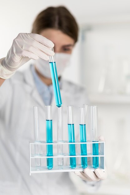 Woman working in laboratory close up