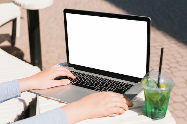 Woman working on laptop mockup