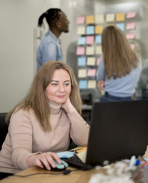 Woman working on laptop at the office