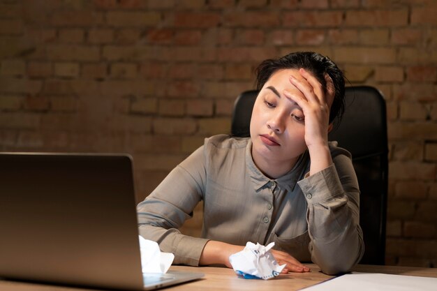 Woman working late for a project