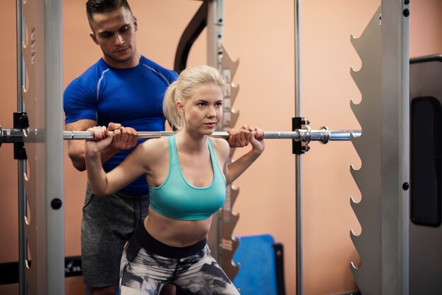 Woman working at muscular build