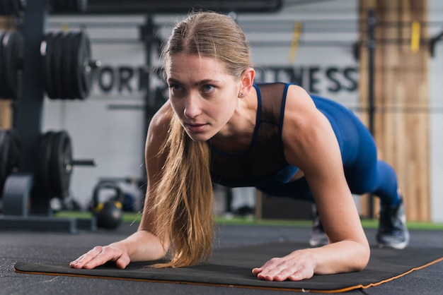 Free photo woman working out in gym