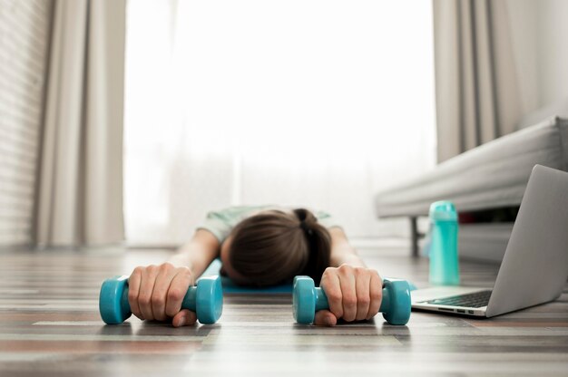 Woman working out at home