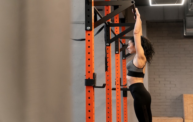 Free photo woman working out indoors