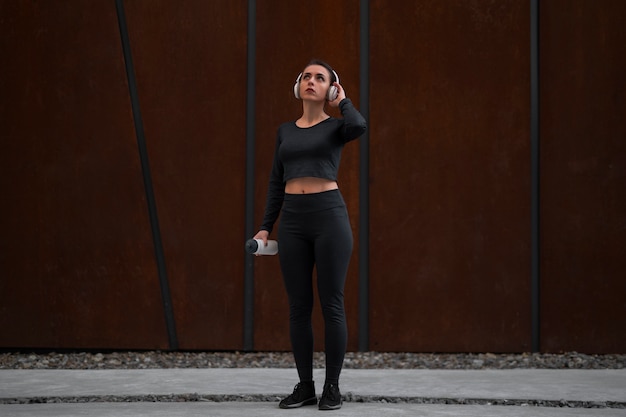 Woman working out outdoors alone