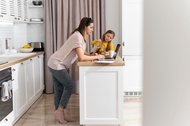 Woman working remotely full shot