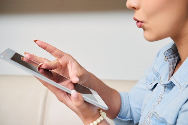 Woman working on tablet