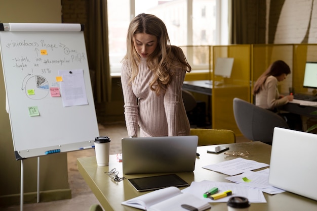 Woman working while pregnant