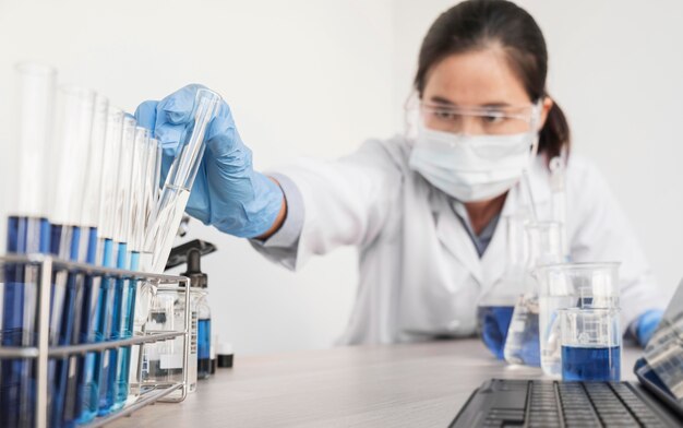 Woman working with chemical substances