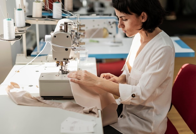 Woman working with sewing machine