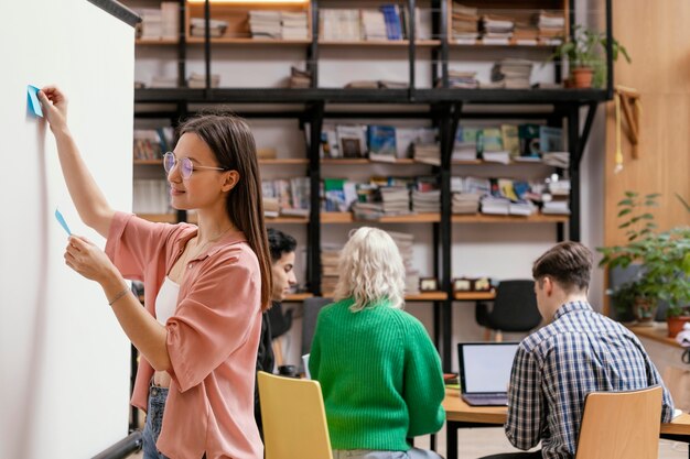 Woman writing business idea