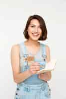 Free photo woman writing down measures during house renovation