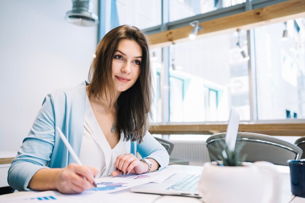 Woman writing notes