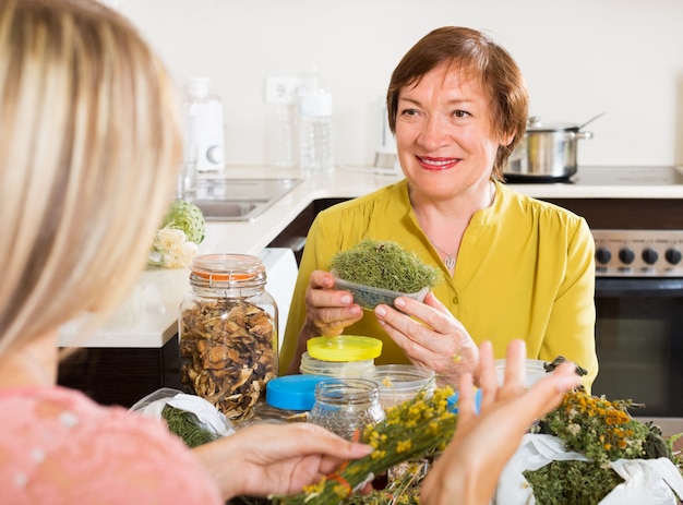 Womans with medicinal herbs