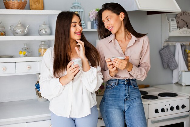 Women in break drinking coffee